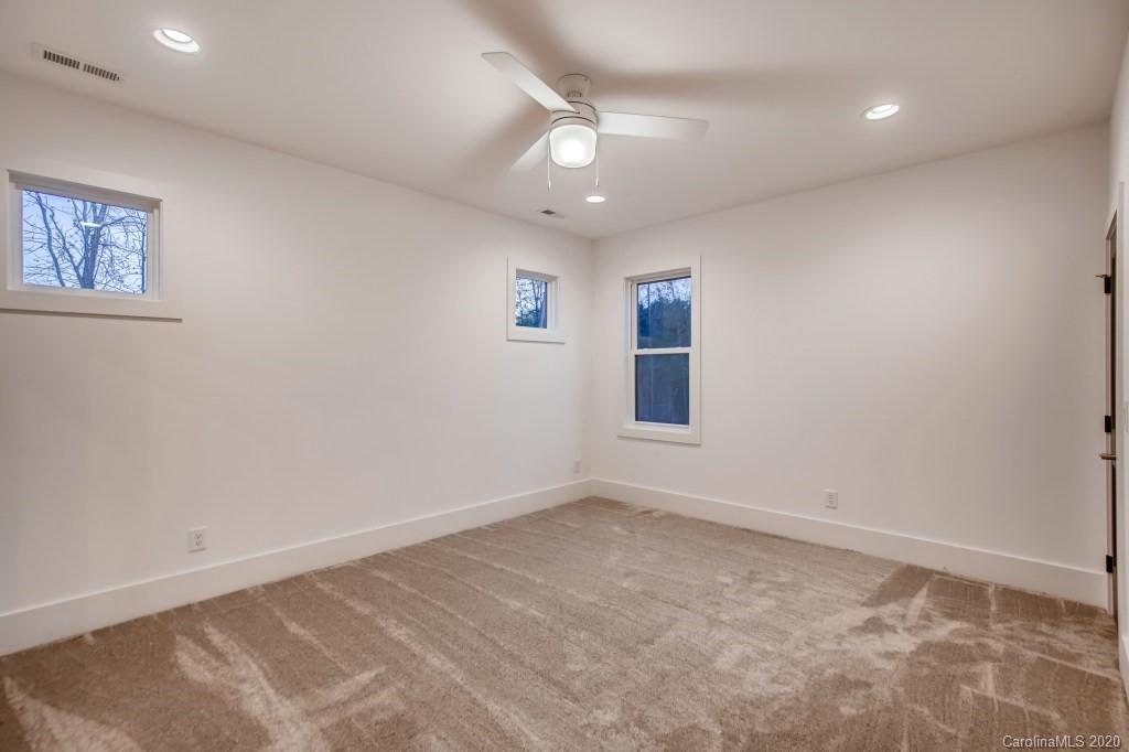 1104 Vision Path Concord, NC 28027 - Photo 21 of 28 a view of an empty room with a window