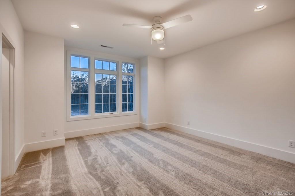 1104 Vision Path Concord, NC 28027 - Photo 24 of 28 wooden floor in an empty room with a window