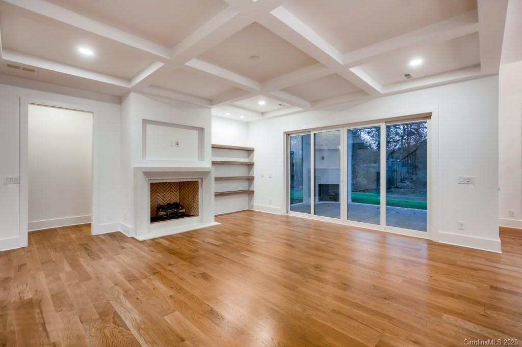 1104 Vision Path Concord, NC 28027 - Photo 6 of 28 a view of an empty room with a fireplace and a window