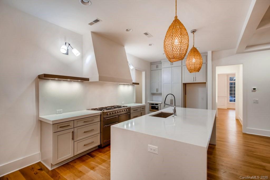 1104 Vision Path Concord, NC 28027 - Photo 10 of 28 a kitchen with cabinets and window
