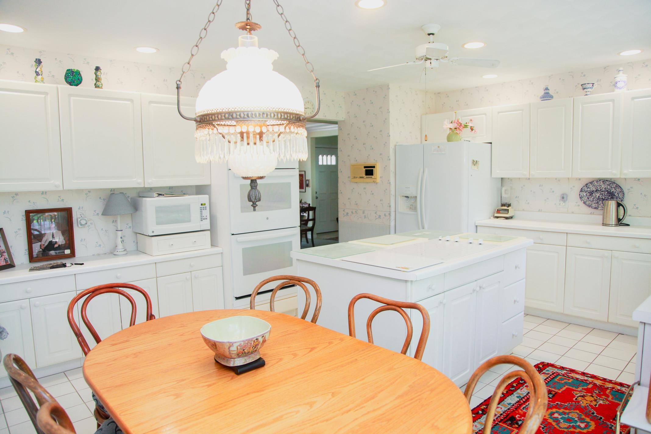 3001 Countryside Lane Freeport, IL 61032 - Photo 24 of 47 a kitchen with a refrigerator and a sink