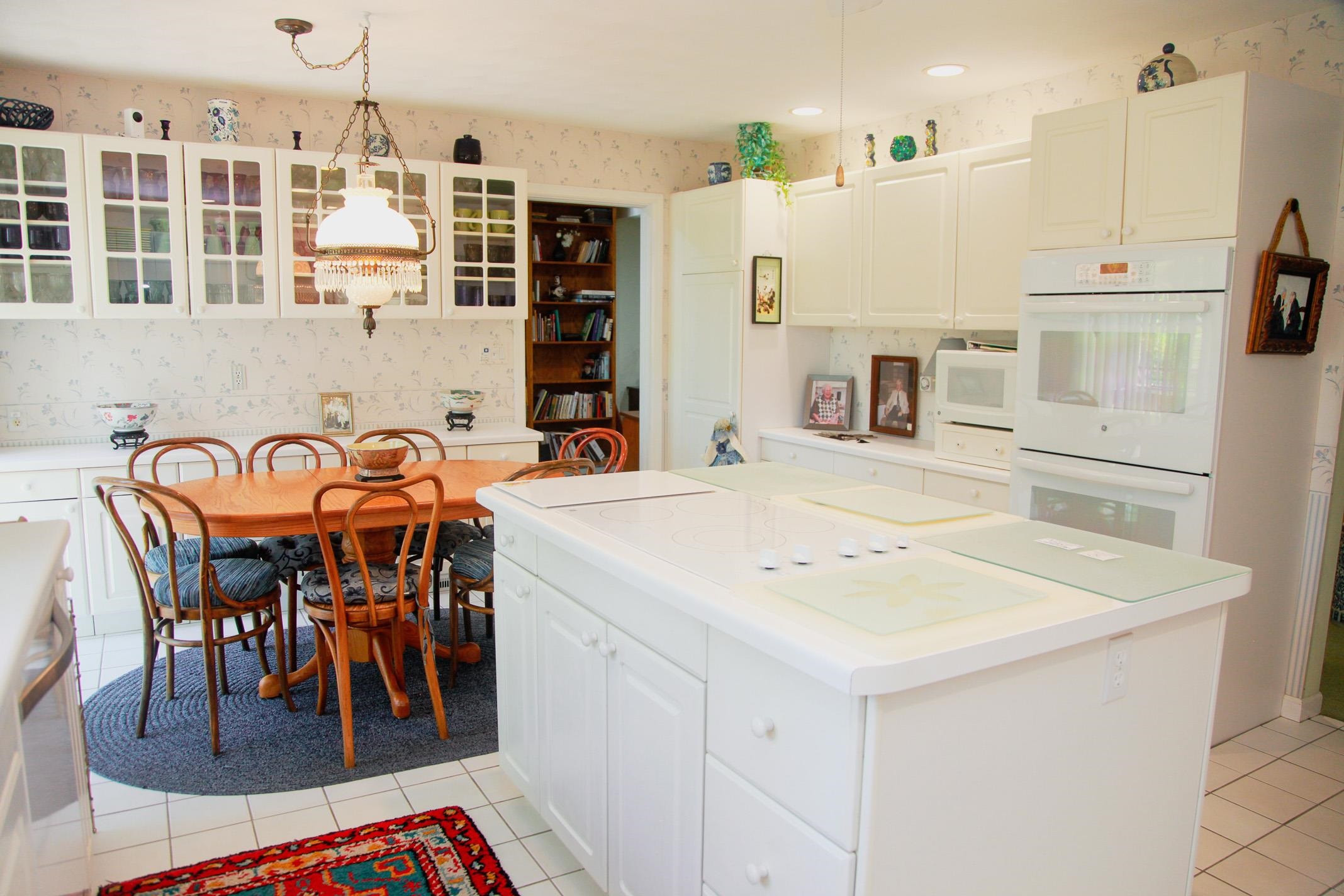 3001 Countryside Lane Freeport, IL 61032 - Photo 25 of 47 a view of kitchen with stainless steel appliances kitchen island dining table and chairs