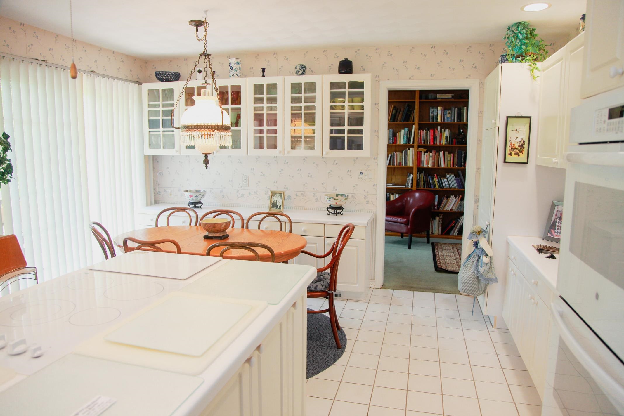 3001 Countryside Lane Freeport, IL 61032 - Photo 26 of 47 a view of a kitchen with dining table and chairs