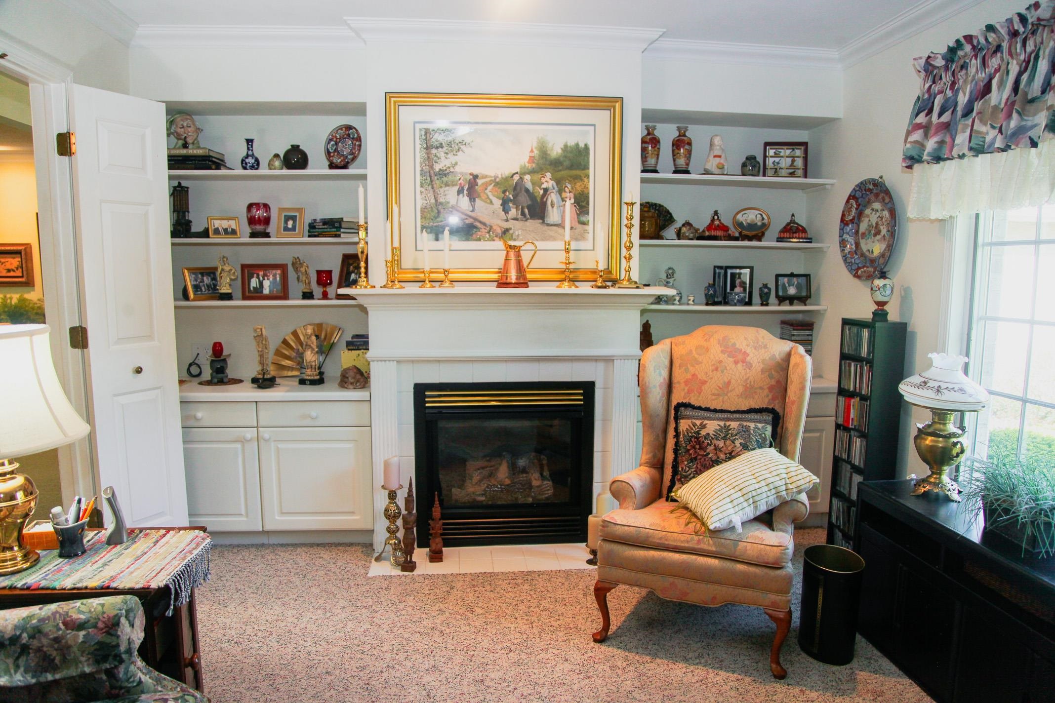 3001 Countryside Lane Freeport, IL 61032 - Photo 9 of 47 a living room with furniture and a fireplace
