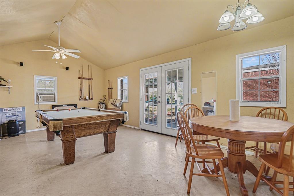 21664 Highway 34 Terrell, TX 75161 - Photo 29 of 34 a room with table chairs and wooden floor