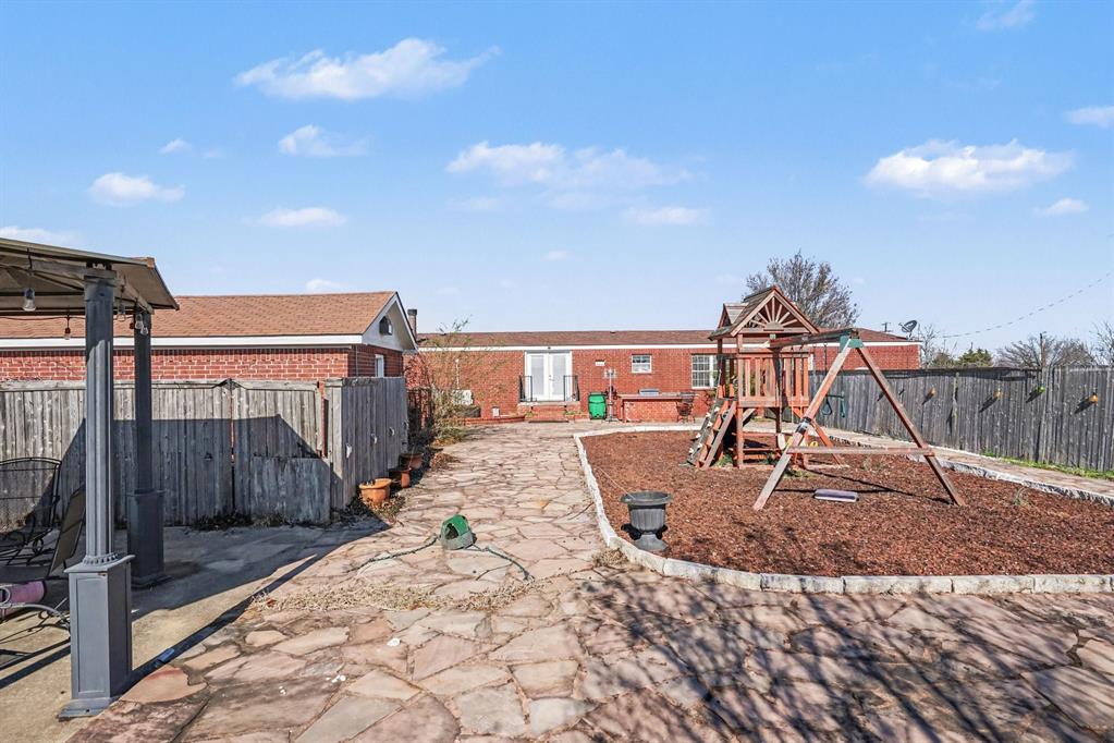 21664 Highway 34 Terrell, TX 75161 - Photo 33 of 34 a view of a swimming pool with a patio