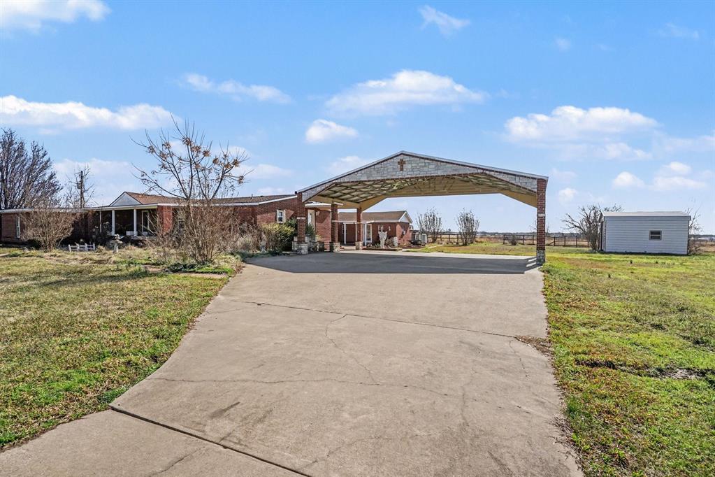 21664 Highway 34 Terrell, TX 75161 - Photo 4 of 34 a view of a house with a yard