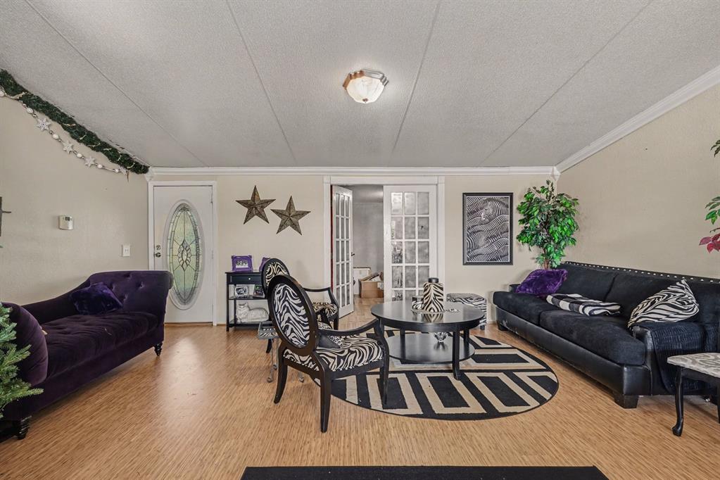 21664 Highway 34 Terrell, TX 75161 - Photo 5 of 34 a living room with furniture and wooden floor