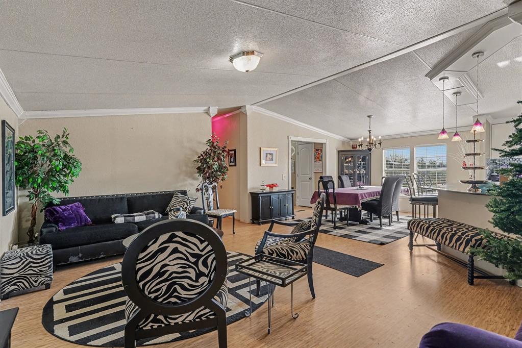 21664 Highway 34 Terrell, TX 75161 - Photo 7 of 34 a living room with furniture and a potted plant