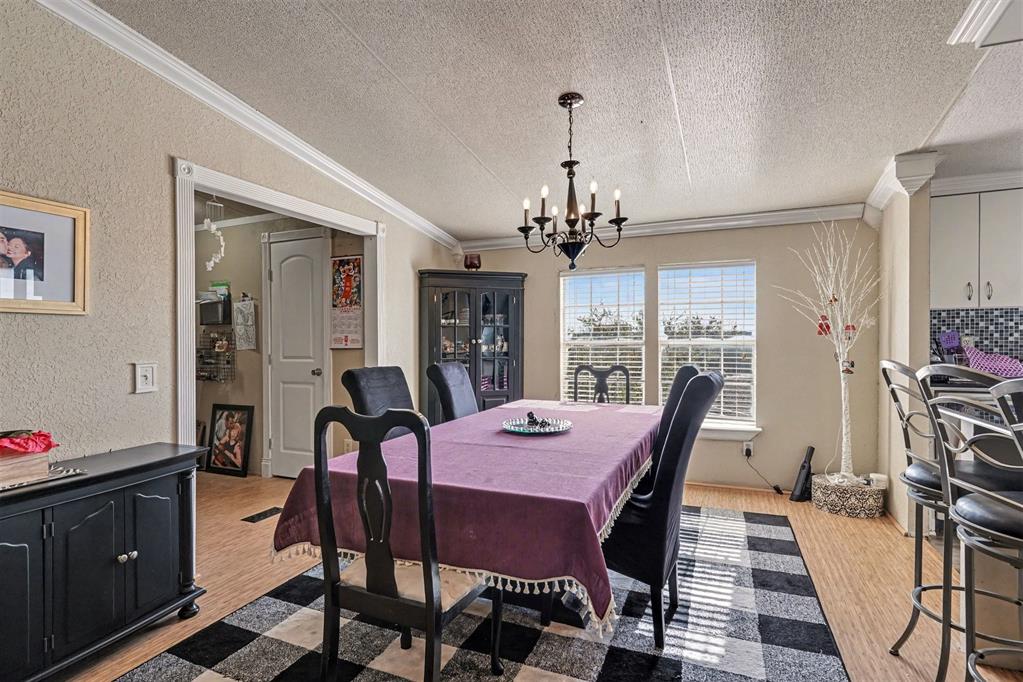 21664 Highway 34 Terrell, TX 75161 - Photo 9 of 34 a view of a dining room with furniture
