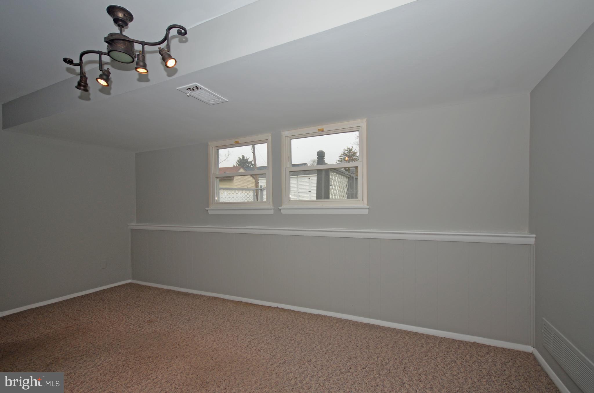 9662 Dundawan Road Baltimore, MD 21236 - Photo 34 of 50 Large family room in basement.