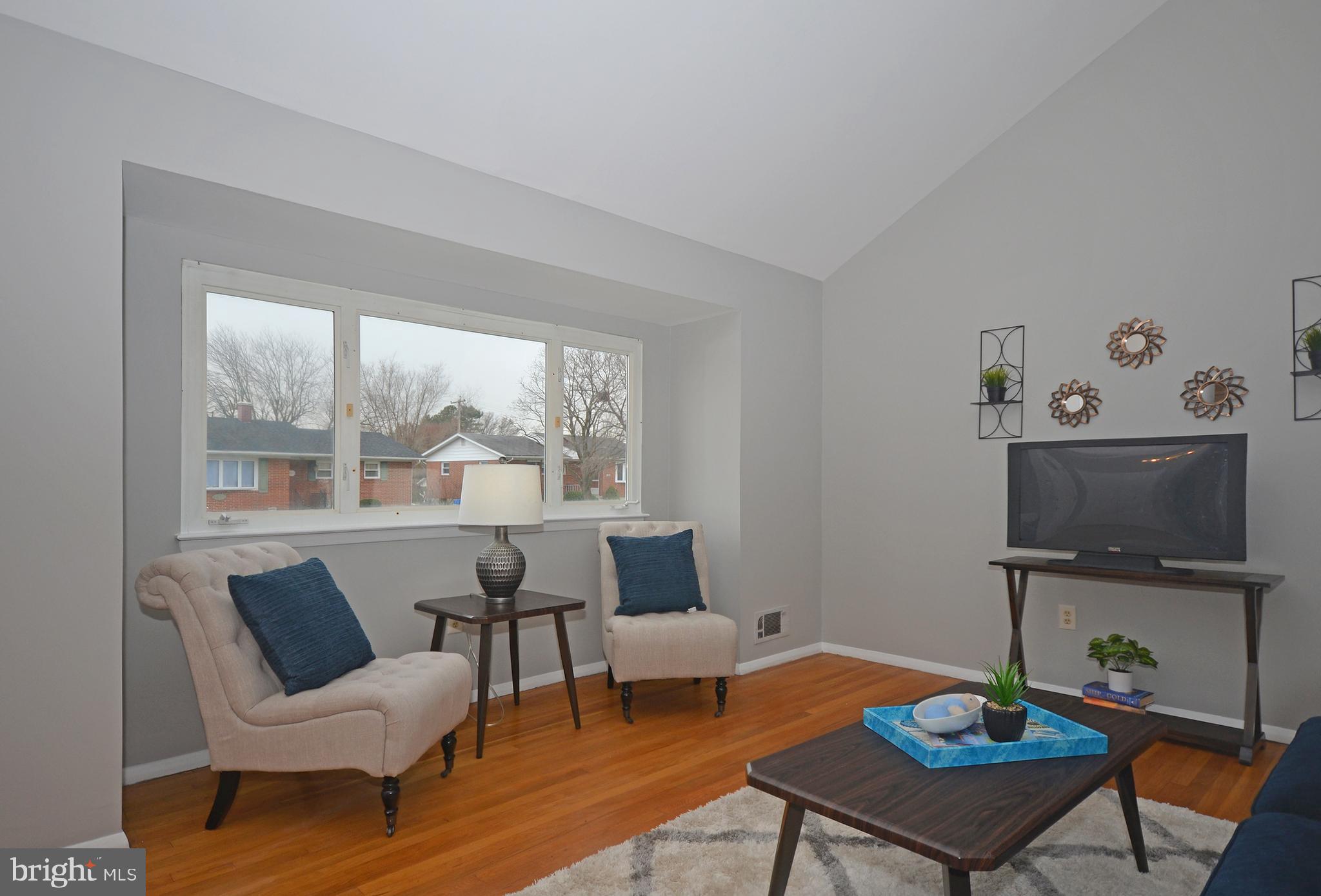 9662 Dundawan Road Baltimore, MD 21236 - Photo 5 of 50 Large windows allow plenty of natural light.