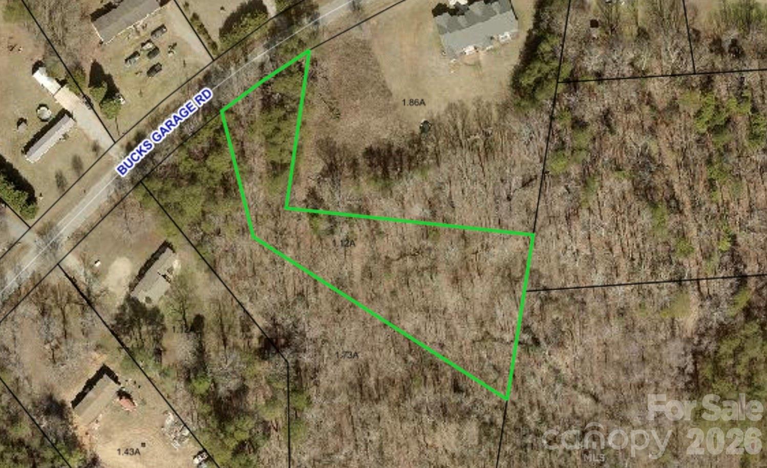 5495 Bucks Garage Road Maiden, NC 28650 - Photo 3 of 16 a view of a yard with a trees