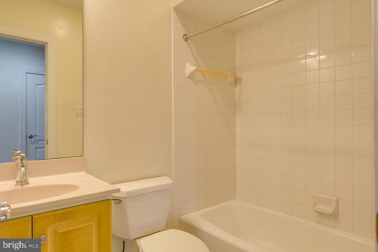 1489 Broadstone Place Vienna, VA 22182 - Photo 13 of 20 a bathroom with a sink and a toilet
