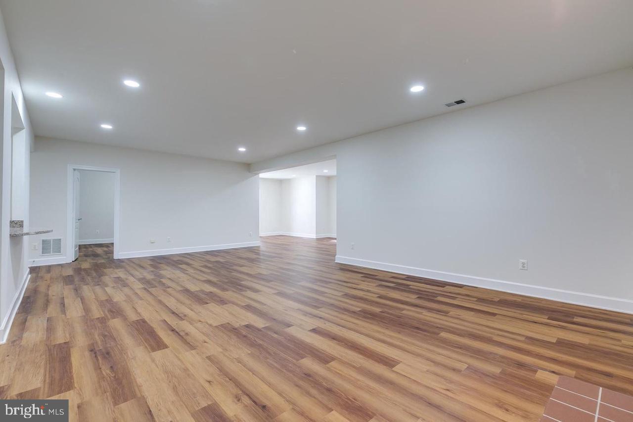 1489 Broadstone Place Vienna, VA 22182 - Photo 18 of 20 a view of empty room with wooden floor