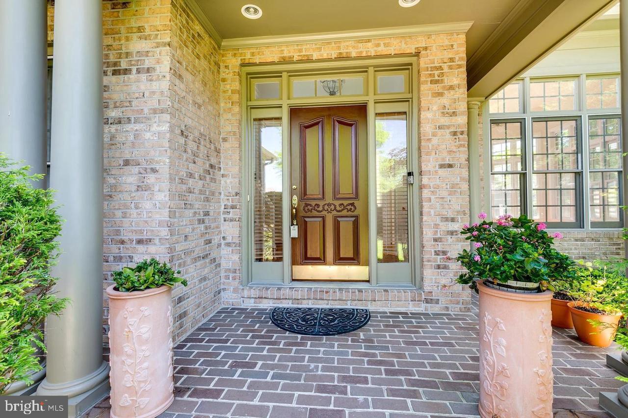 1489 Broadstone Place Vienna, VA 22182 - Photo 3 of 20 a view of a entryway door of the house