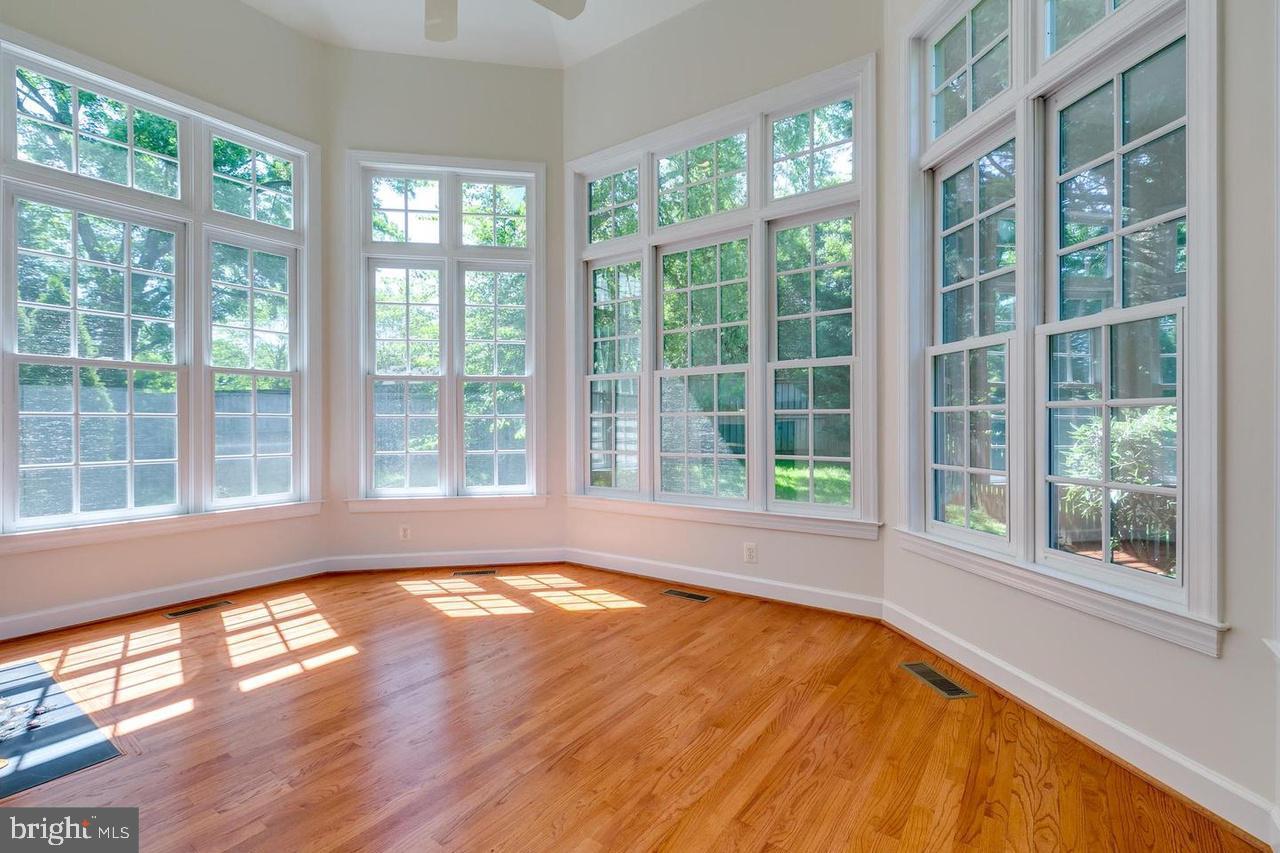 1489 Broadstone Place Vienna, VA 22182 - Photo 10 of 20 a view of an empty room with a large windows