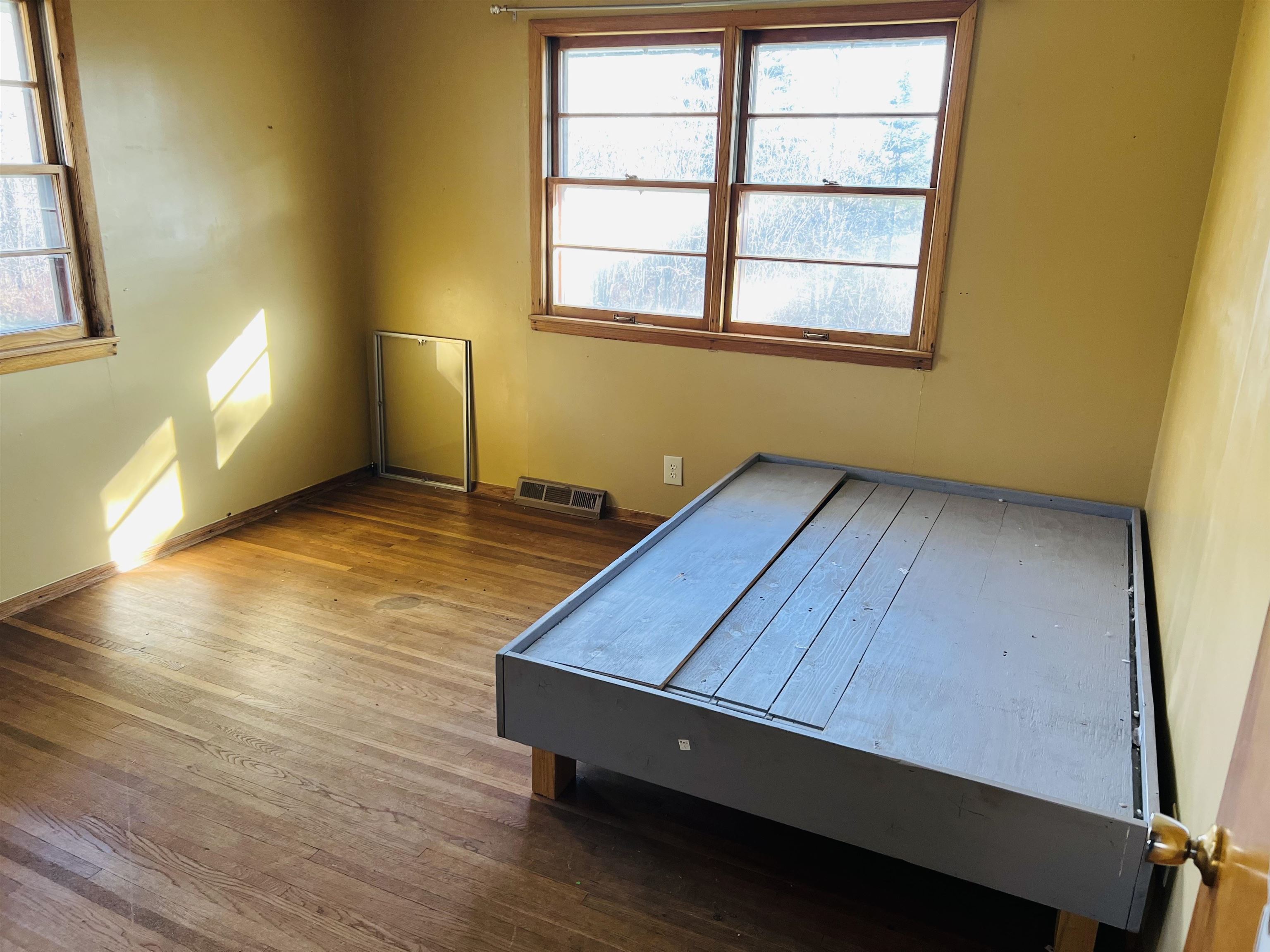 118 Rollins Ridge Tofte, MN 55615 - Photo 10 of 18 Bedroom with hardwood flooring and baseboards