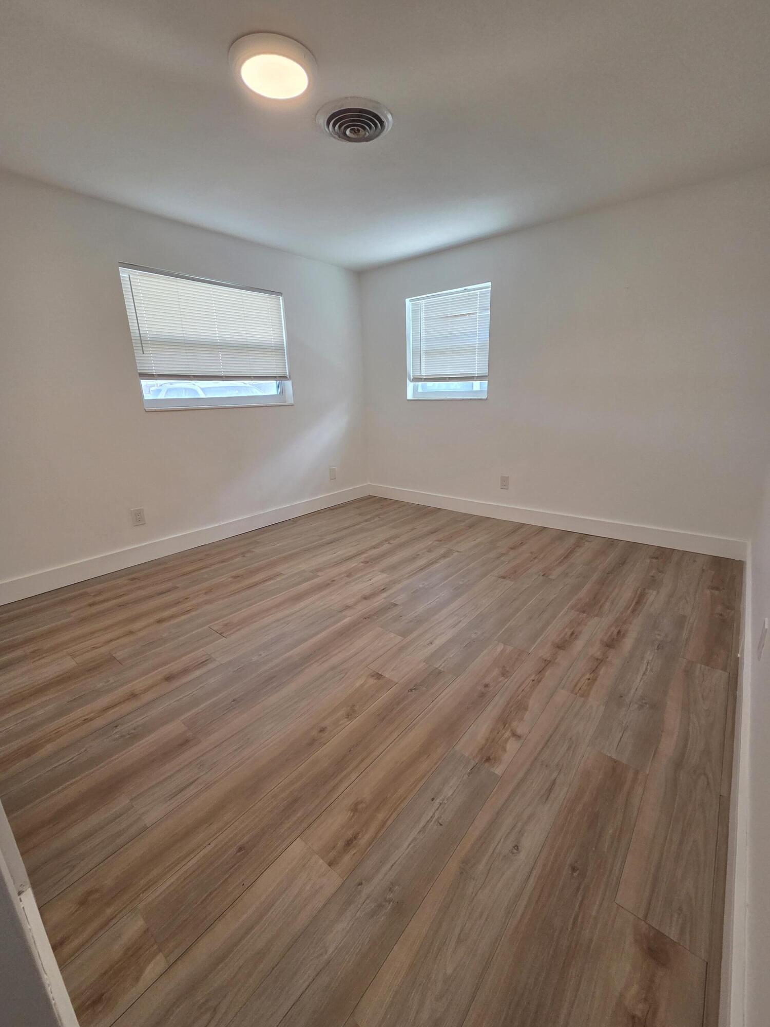 100 Southwest Hideaway Place Stuart, FL 34994 - Photo 13 of 27 100 front bedroom