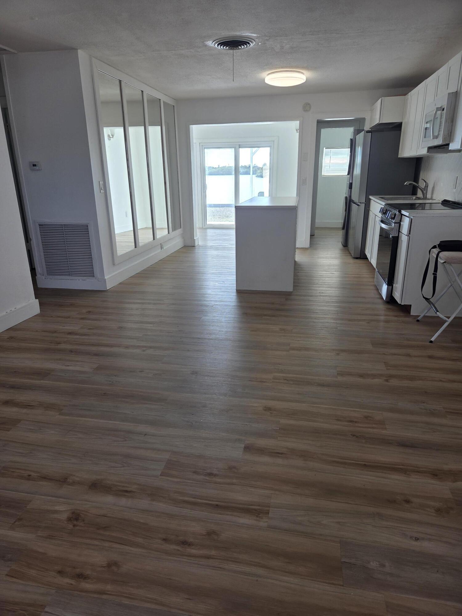 100 Southwest Hideaway Place Stuart, FL 34994 - Photo 27 of 27 100 living kitchen view