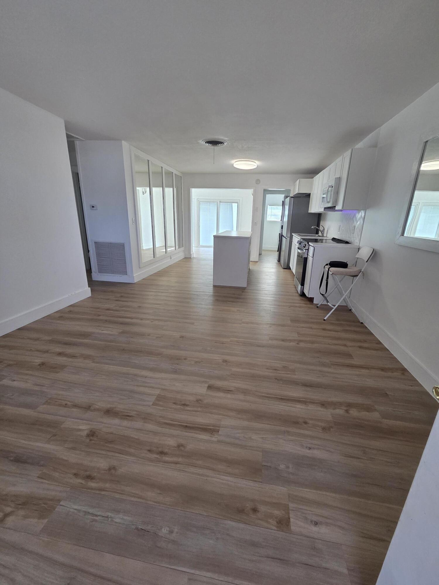 100 Southwest Hideaway Place Stuart, FL 34994 - Photo 7 of 27 100 living kitchen