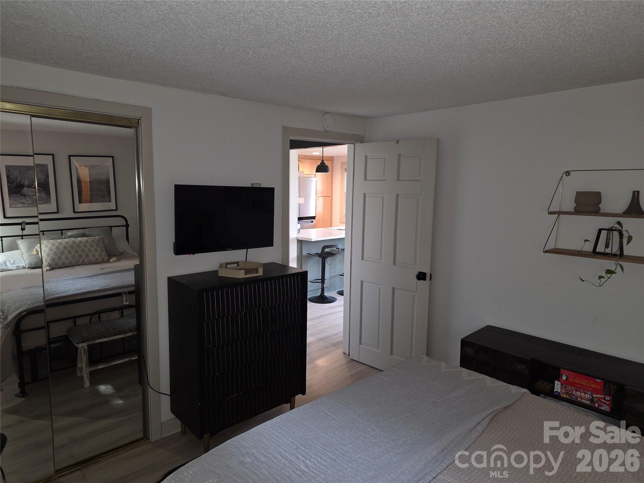 108 Northridge Road, Unit 1B Banner Elk, NC 28604 - Photo 18 of 34 a bedroom with a bed and television