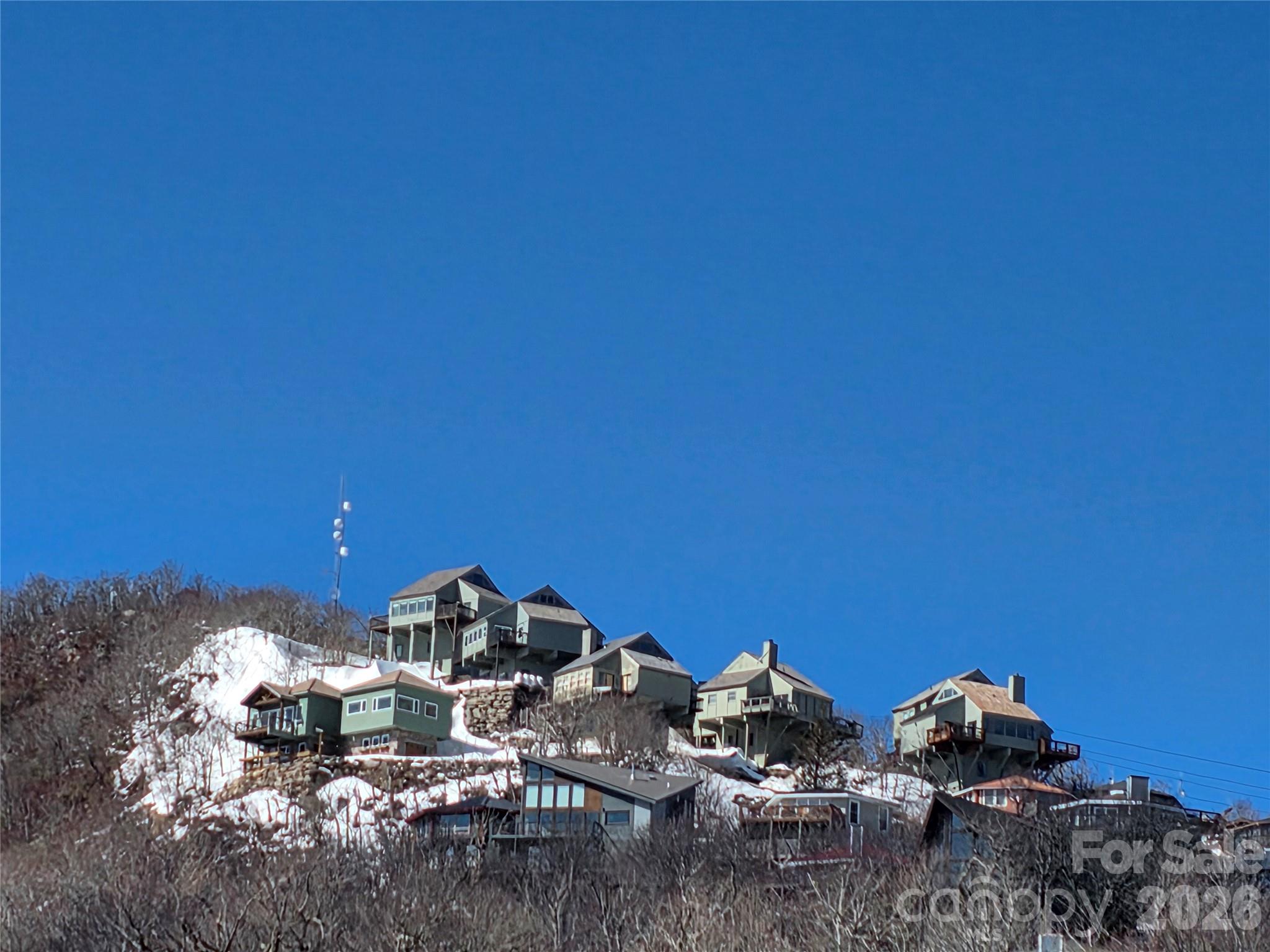108 Northridge Road, Unit 1B Banner Elk, NC 28604 - Photo 22 of 34 a view of a backyard with sitting area