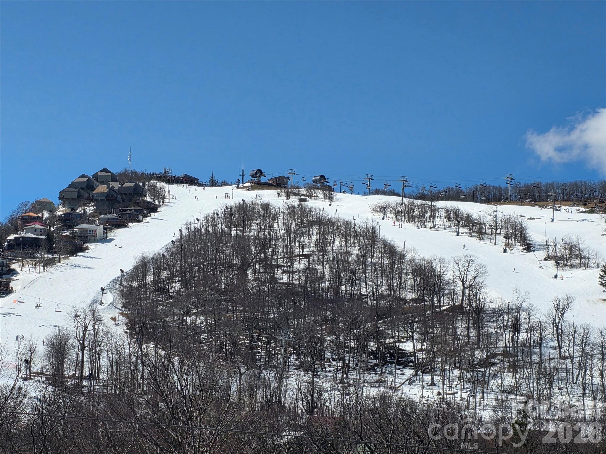 108 Northridge Road, Unit 1B Banner Elk, NC 28604 - Photo 24 of 34 a view of roof with a building in background