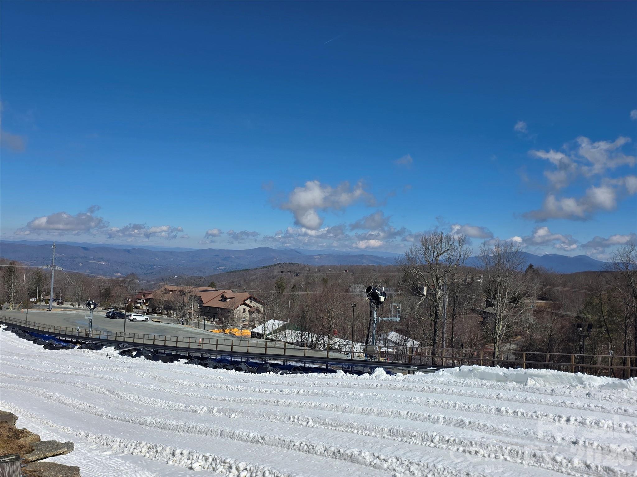108 Northridge Road, Unit 1B Banner Elk, NC 28604 - Photo 27 of 34 a view of a snow on the middle of a road