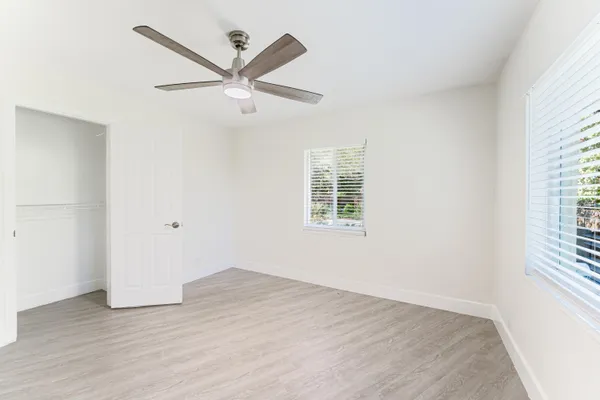 a view of an empty room with a window