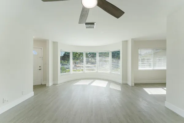 a view of an empty room with a window