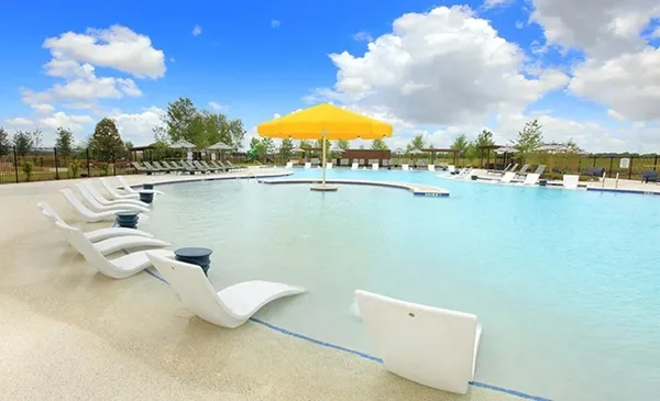 a view of a patio with swimming pool