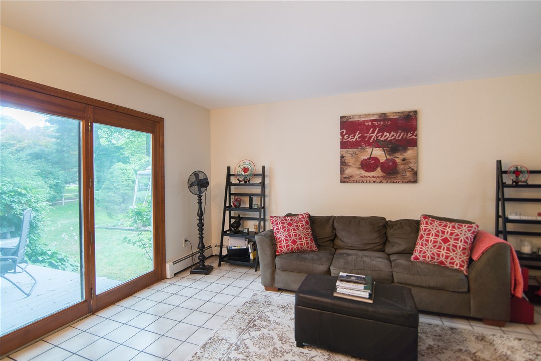 8 Ridgeland Road Barrington, RI 02806 - Photo 11 of 18 family room overlooking backyard