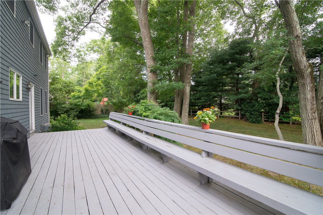 8 Ridgeland Road Barrington, RI 02806 - Photo 5 of 18 large back deck with built in seat