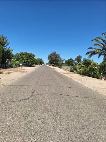 front view of a house with a street