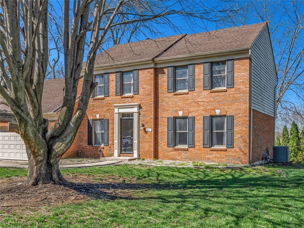 25 Callaway Springboro, OH 45066 - Photo 3 of 51 This brick residence offers a classic facade with architectural details and a welcoming entrance.