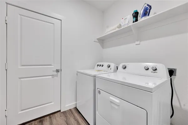 a utility room with dryer and washer