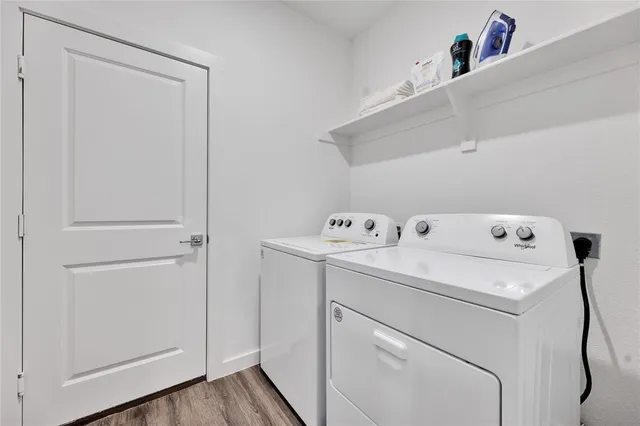 a utility room with dryer and washer