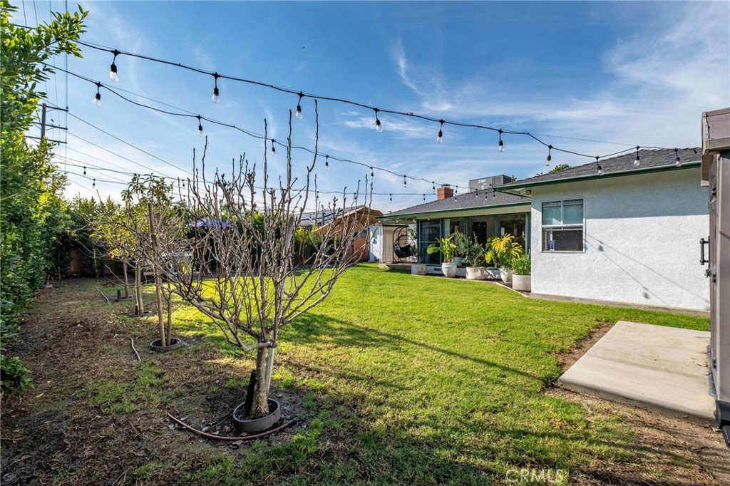 1036 East 45th Way Long Beach, CA 90807 - Photo 28 of 31 a view of a porch with furniture and a yard