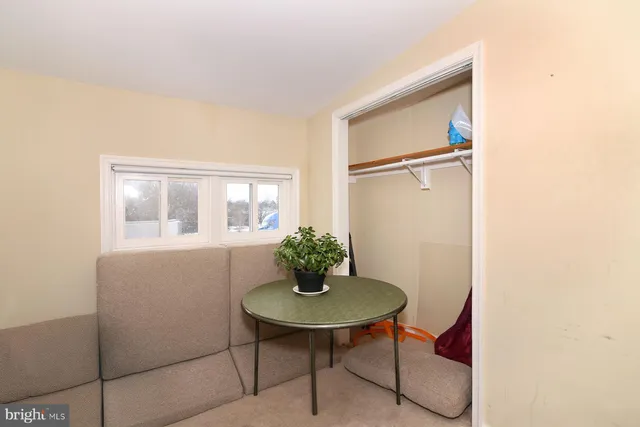 a view of a livingroom with furniture and wooden floor