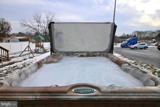 a view of a snow on the road