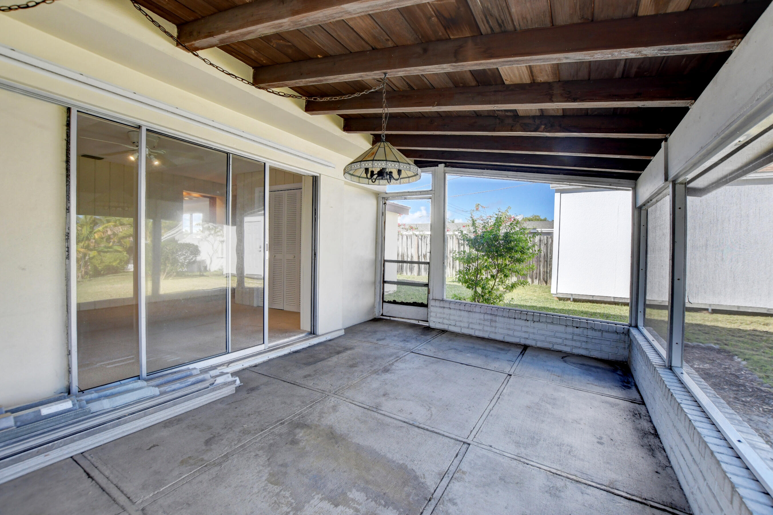 4554 Northeast 4th Avenue Boca Raton, FL 33431 - Photo 31 of 37 31_Florida room connects w/ family room