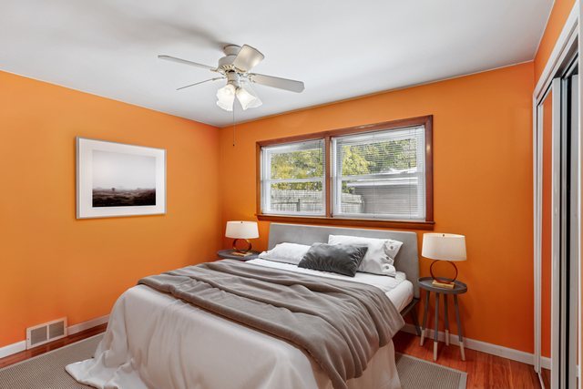 9219 South Spaulding Avenue Evergreen Park, IL 60805 - Photo 15 of 23 a bedroom with a bed and a window