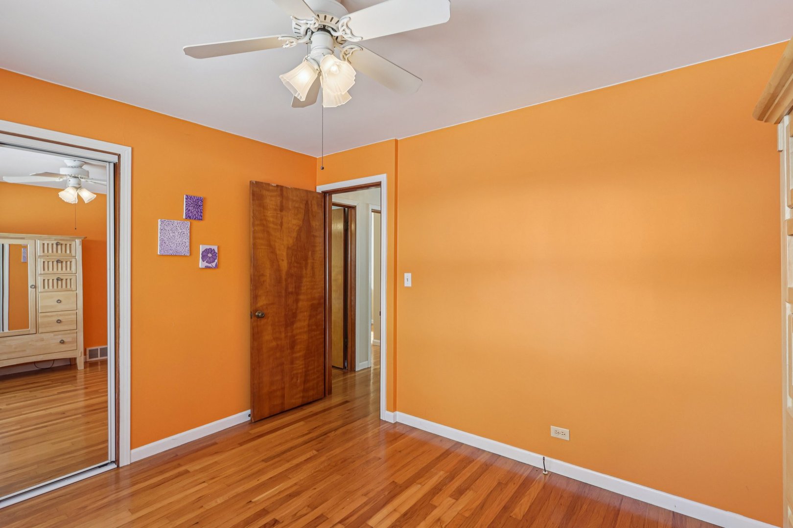 9219 South Spaulding Avenue Evergreen Park, IL 60805 - Photo 16 of 23 en empty room with wooden floor and window