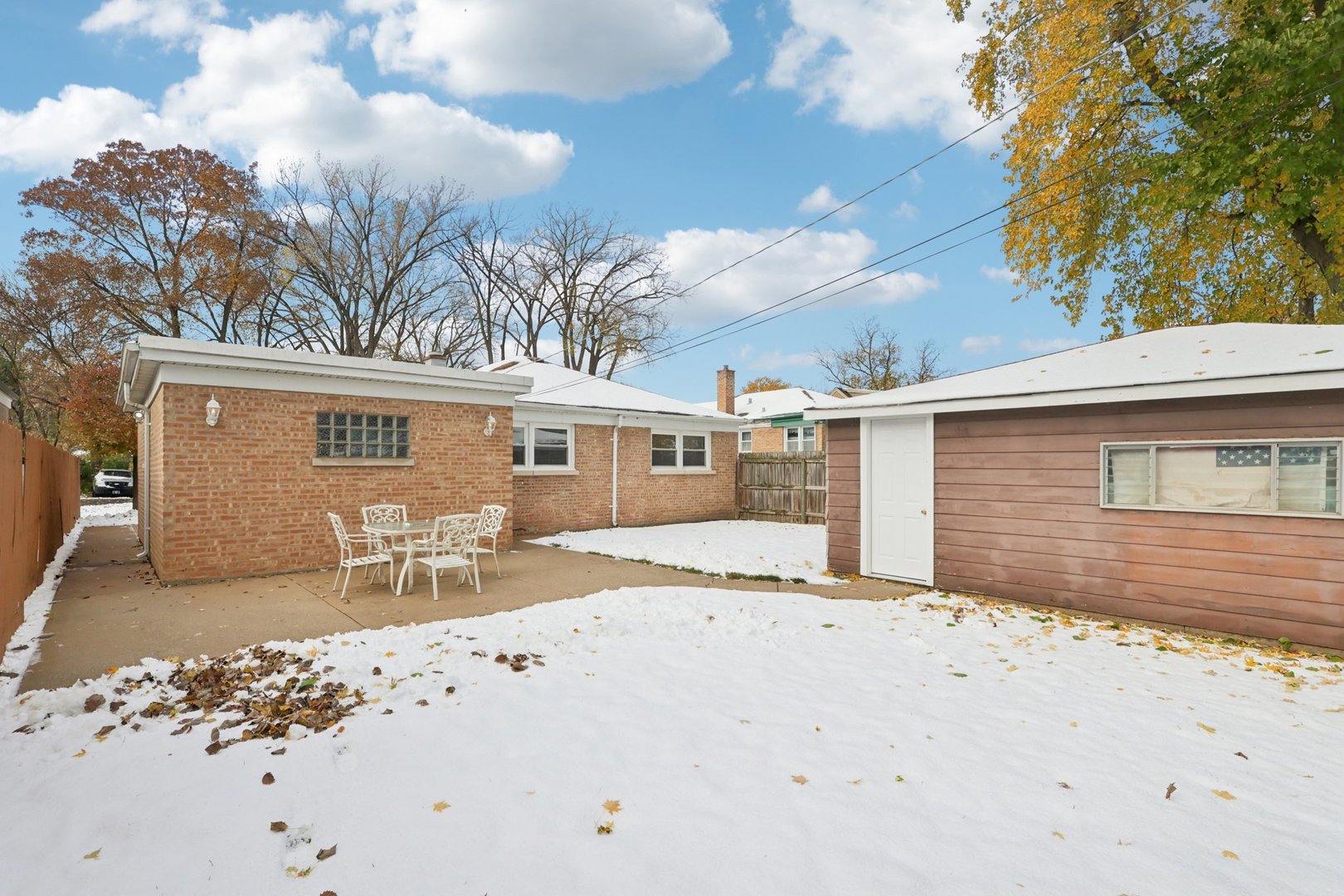 9219 South Spaulding Avenue Evergreen Park, IL 60805 - Photo 20 of 23 front view of a house with a yard