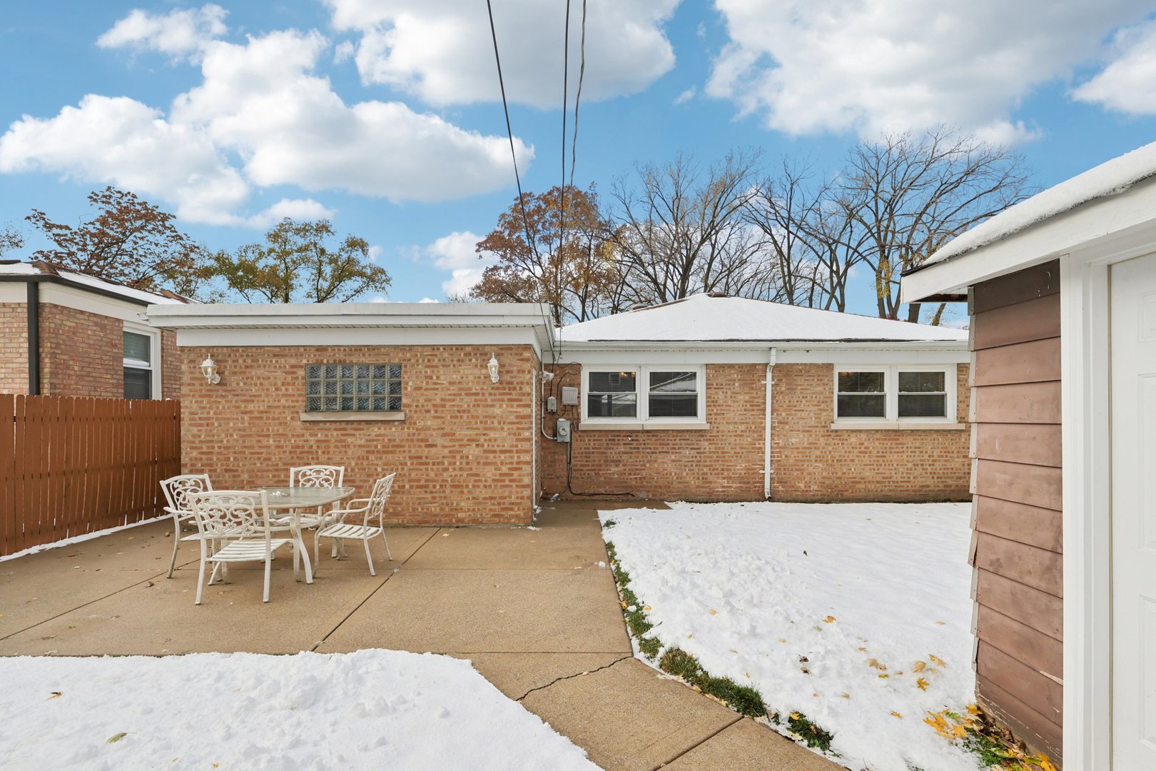 9219 South Spaulding Avenue Evergreen Park, IL 60805 - Photo 21 of 23 a front view of a house with a yard