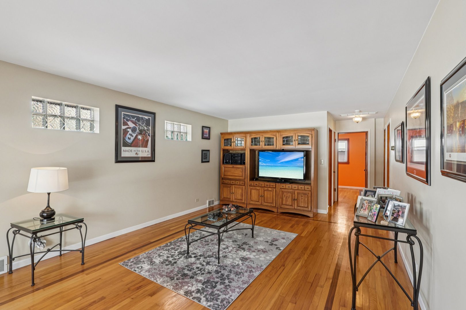 9219 South Spaulding Avenue Evergreen Park, IL 60805 - Photo 4 of 23 a living room with furniture and a flat screen tv