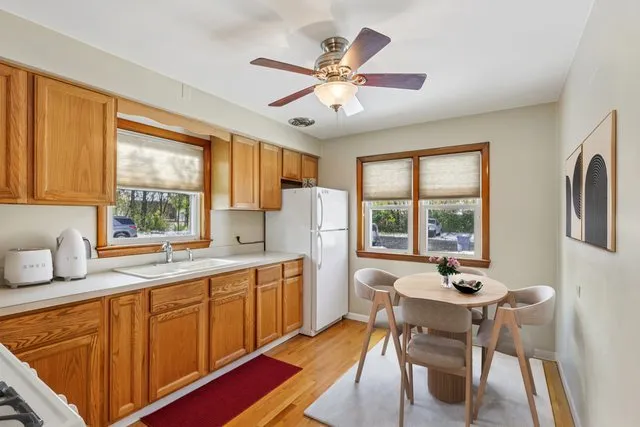 a view of a dining room with furniture window and outside view