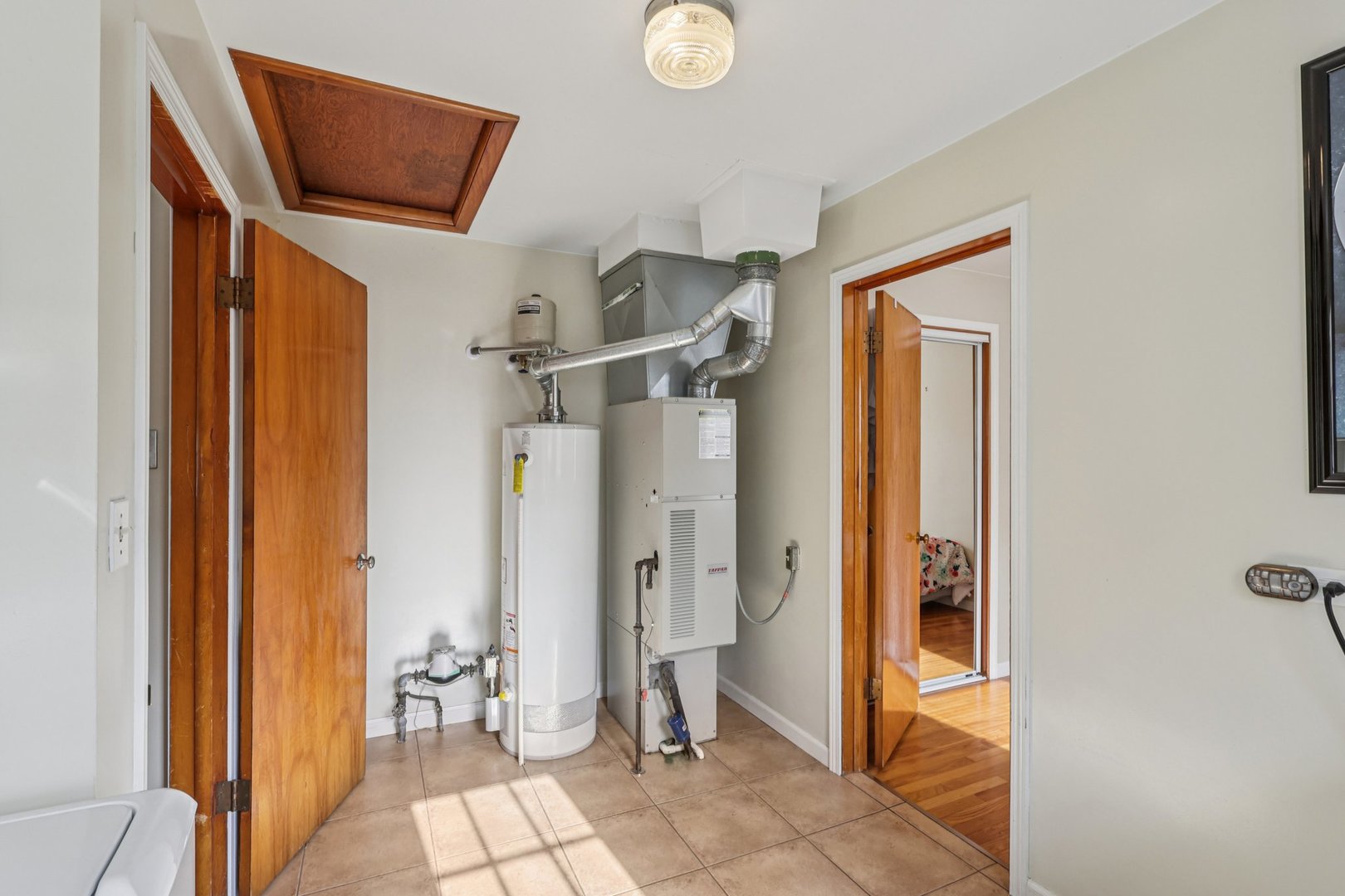 9219 South Spaulding Avenue Evergreen Park, IL 60805 - Photo 10 of 23 a view of a bathroom with a shower and a sink