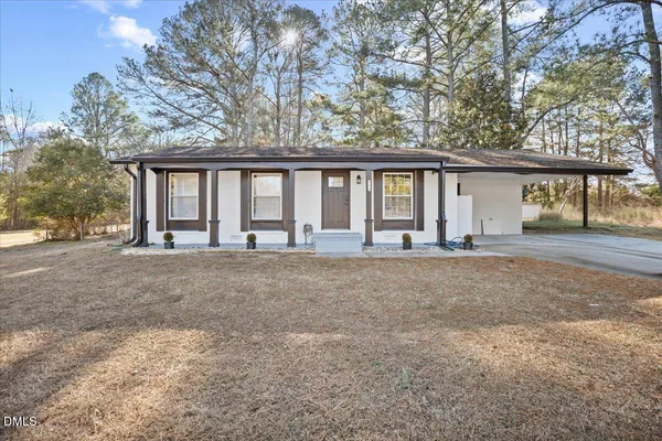 a view of large house with a street